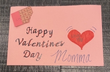 A handwritten card reading "Happy Valentine's Day Momma"